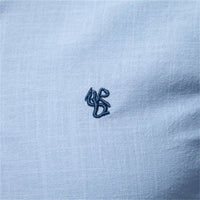 Thumbnail for Light blue fabric with a small embroidered logo in the center