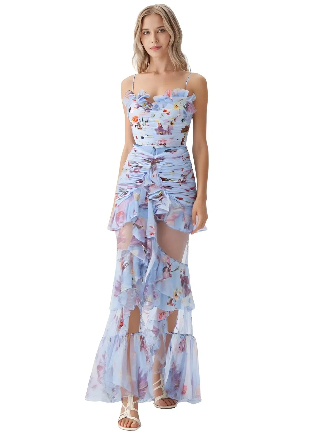 Woman wearing a floral swimsuit and matching cover up on a white background