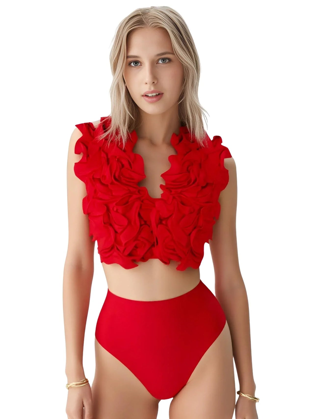 Woman wearing a red floral bikini top and high-waisted bottoms on a white background