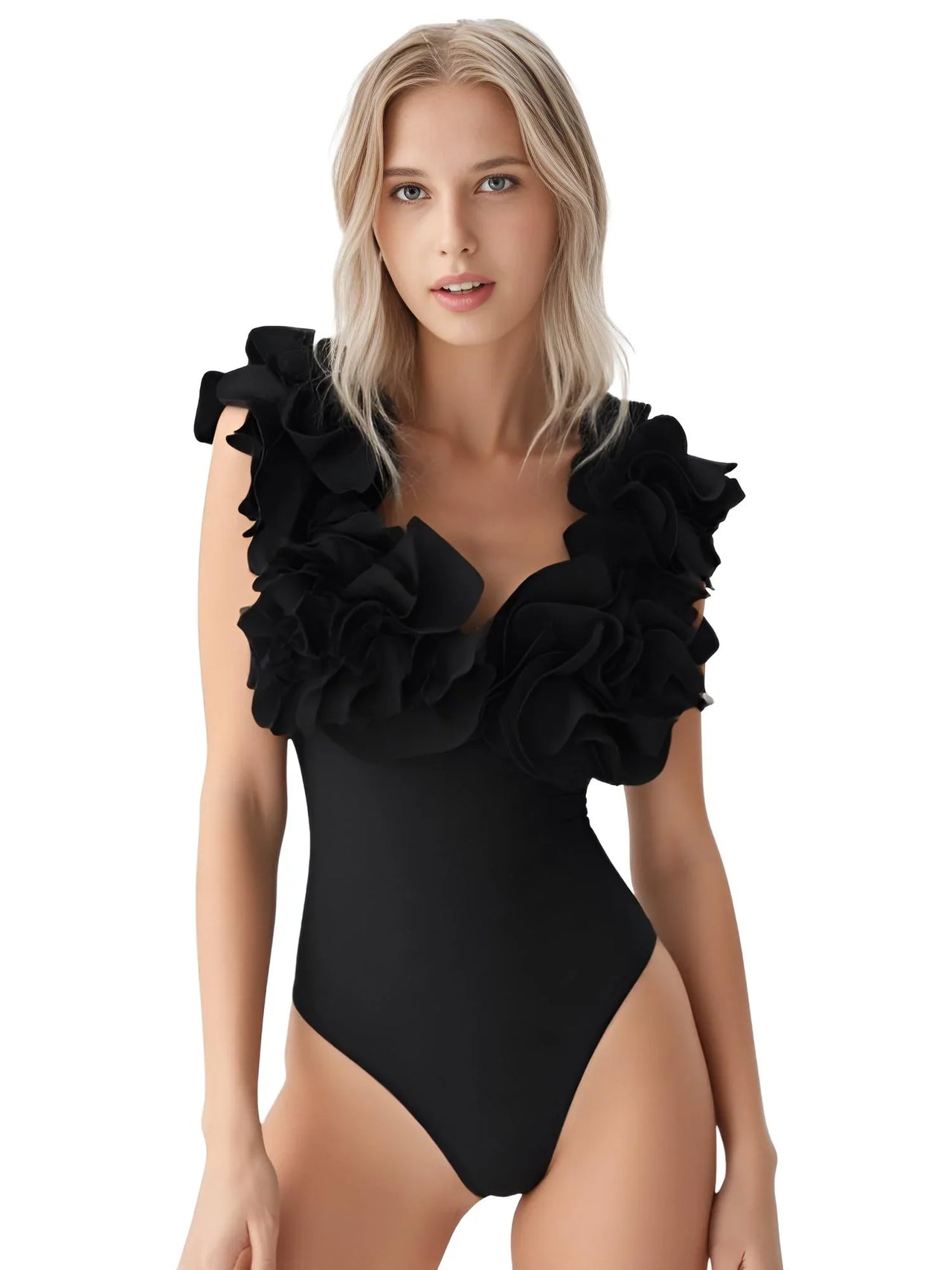 Woman wearing a black one-piece swimsuit with ruffled shoulders on a white background