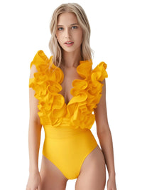 Thumbnail for Woman wearing a yellow ruffled swimsuit on a white background