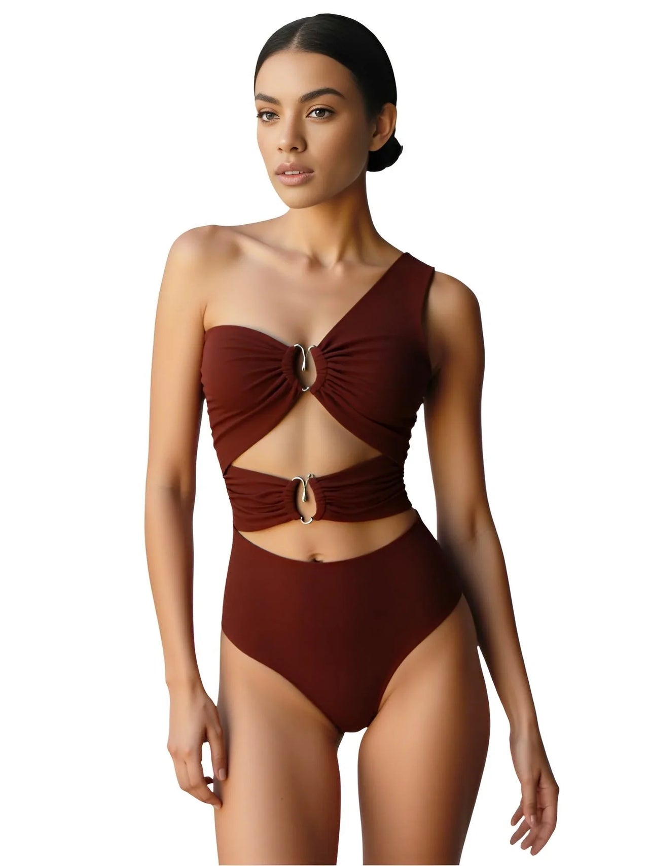 Woman wearing a brown swimsuit with cut-out design on a white background