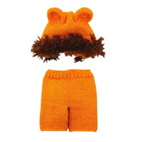 Thumbnail for Knitted outfit with orange hat and shorts on a white background