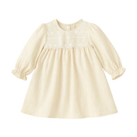 Thumbnail for Beige dress with lace neckline on a white background