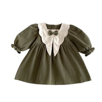 Thumbnail for Green dress with white peter pan collar and bow on a white background