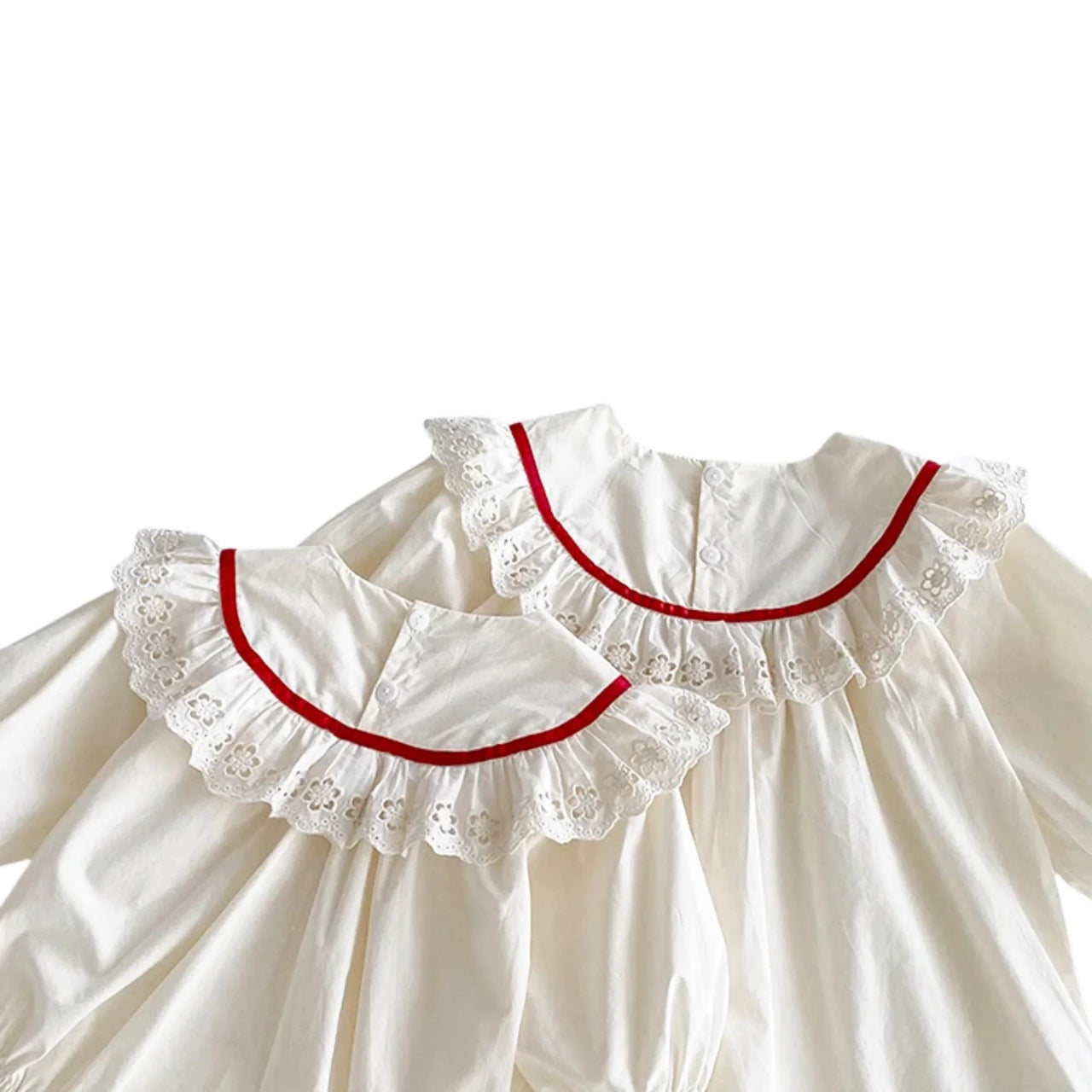 White dress with red trim on a white background