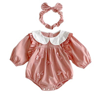 Thumbnail for Pink baby romper with white collar and matching headband on a white background