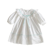 Thumbnail for White blouse with green trim on a white background