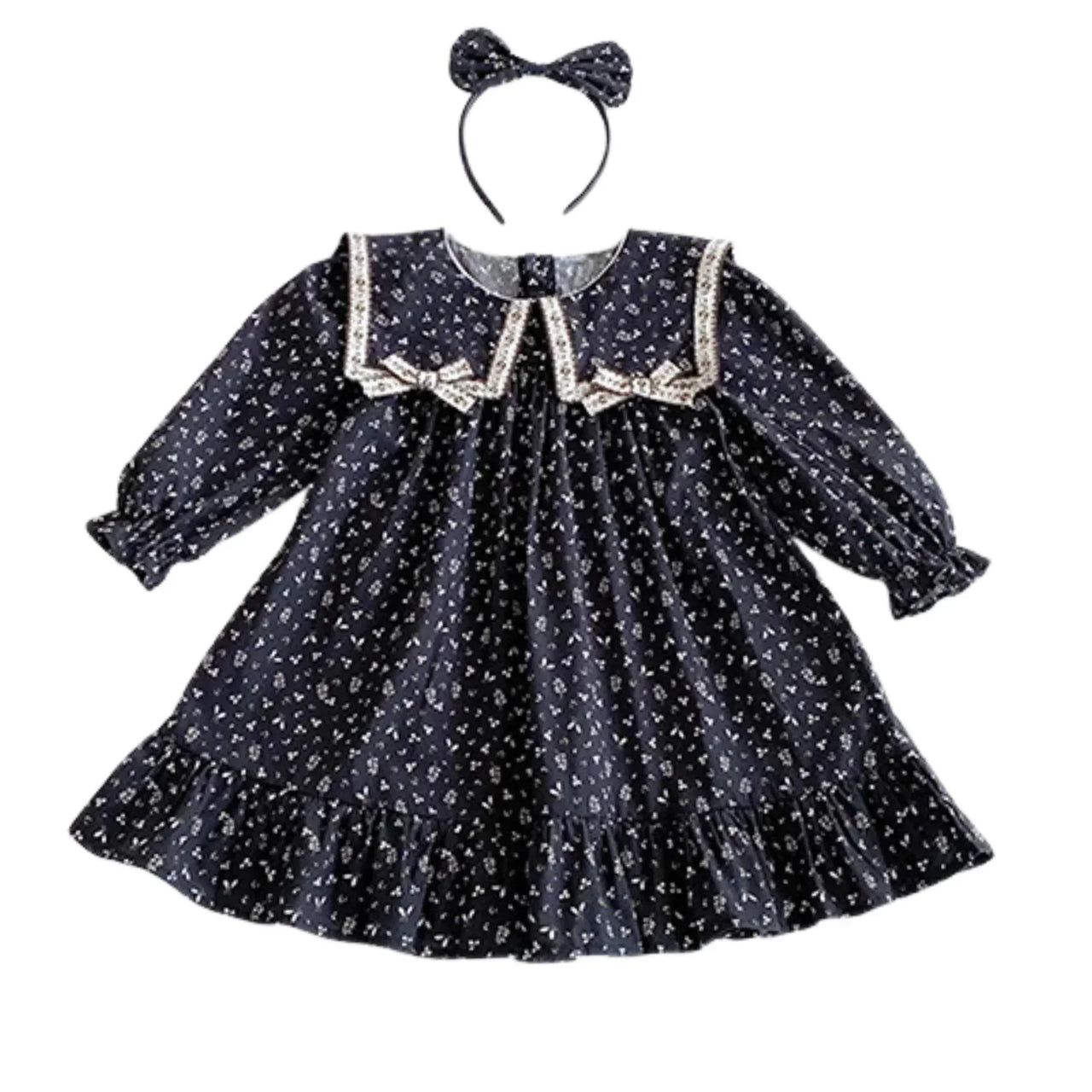 Navy floral dress with white collar and matching headband on a white background
