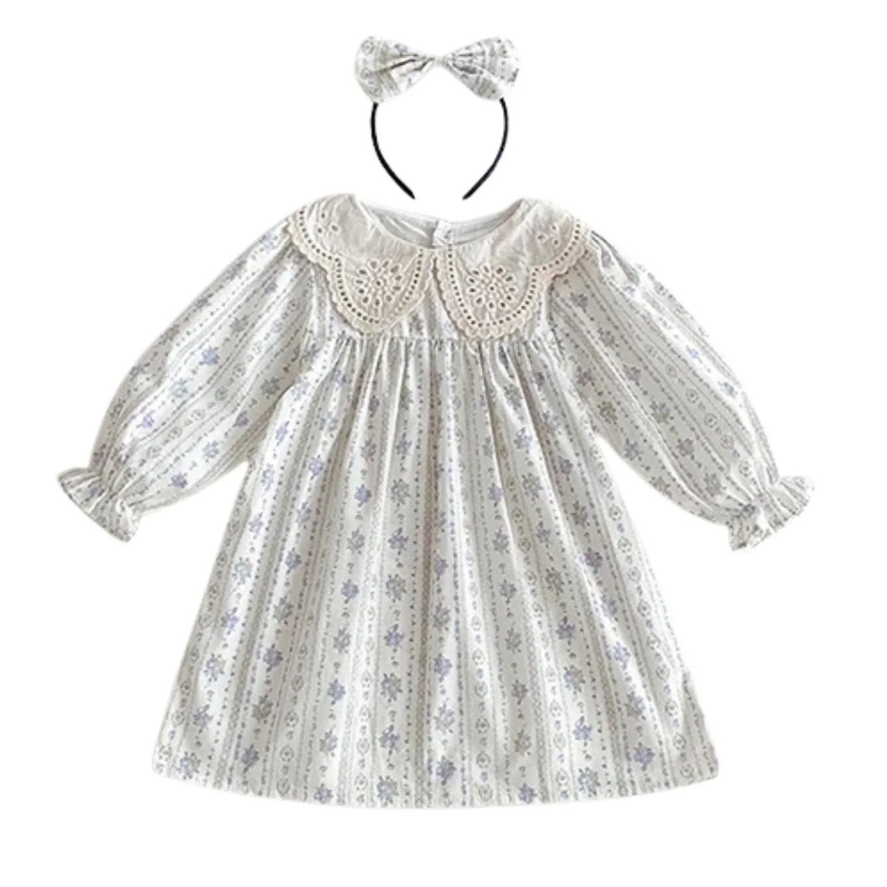 Floral dress with long sleeves and a headband on a white background