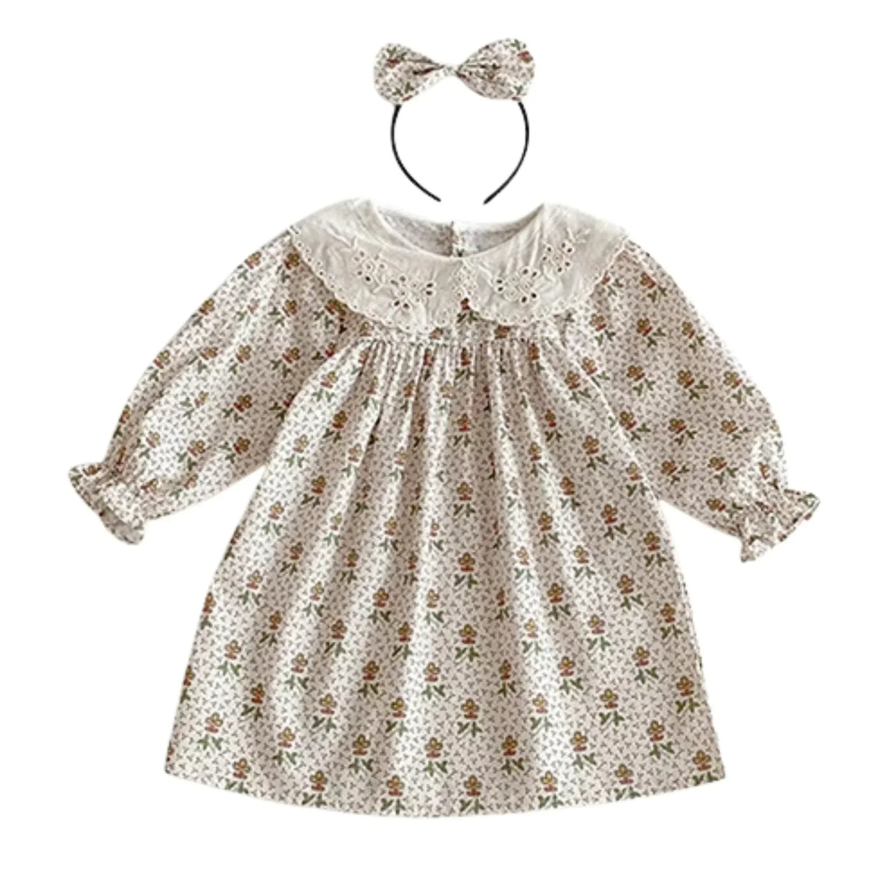 Floral dress with long sleeves and matching headband on a white background