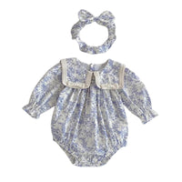 Thumbnail for Baby romper with floral pattern and matching headband on a white background