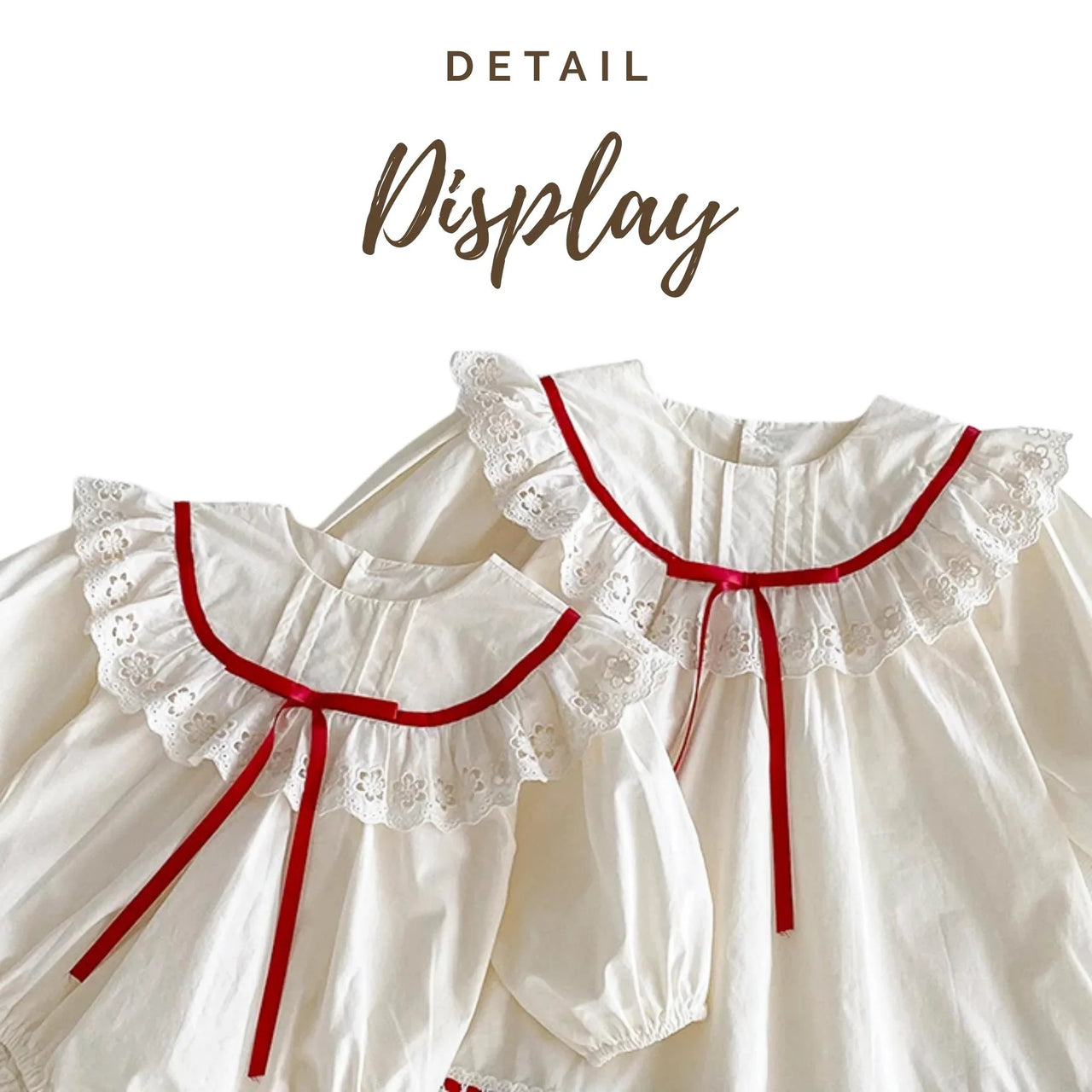 White baby dresses with red trim on a white background