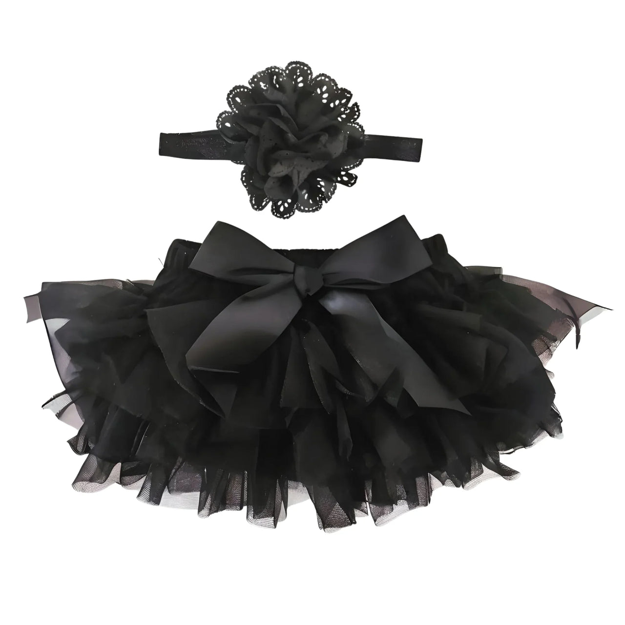 Black tutu skirt and headband set on a white background