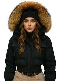 Thumbnail for Woman wearing a black winter coat with a fur-lined hood on a white background