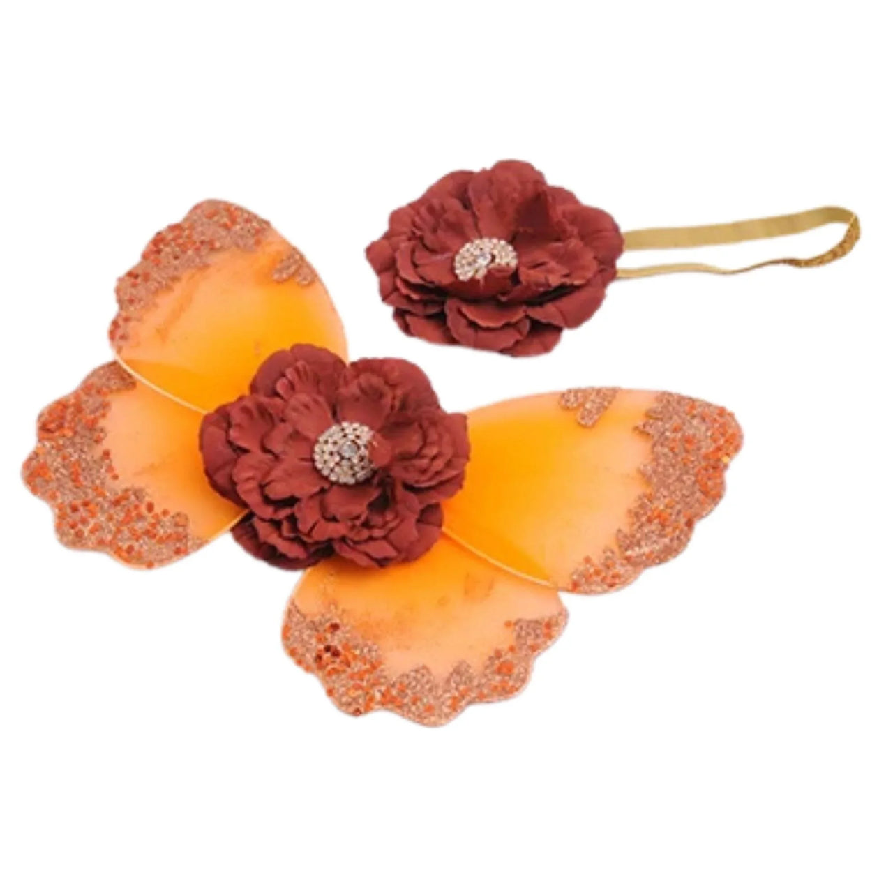 Set of orange and red floral hair accessories on a white background