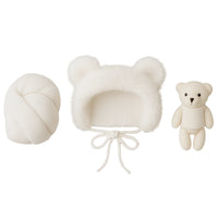 Thumbnail for Set of white baby hat, newborn wrap, and teddy bear on a white background