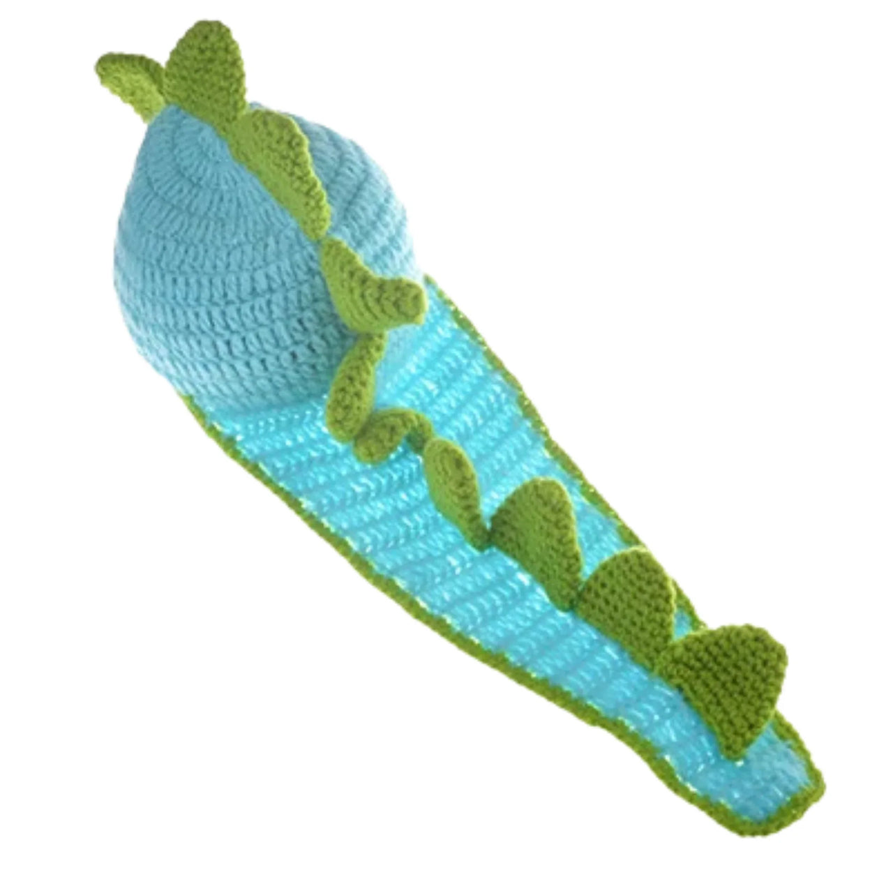 Crocheted blue and green dragon-shaped toy on a white background