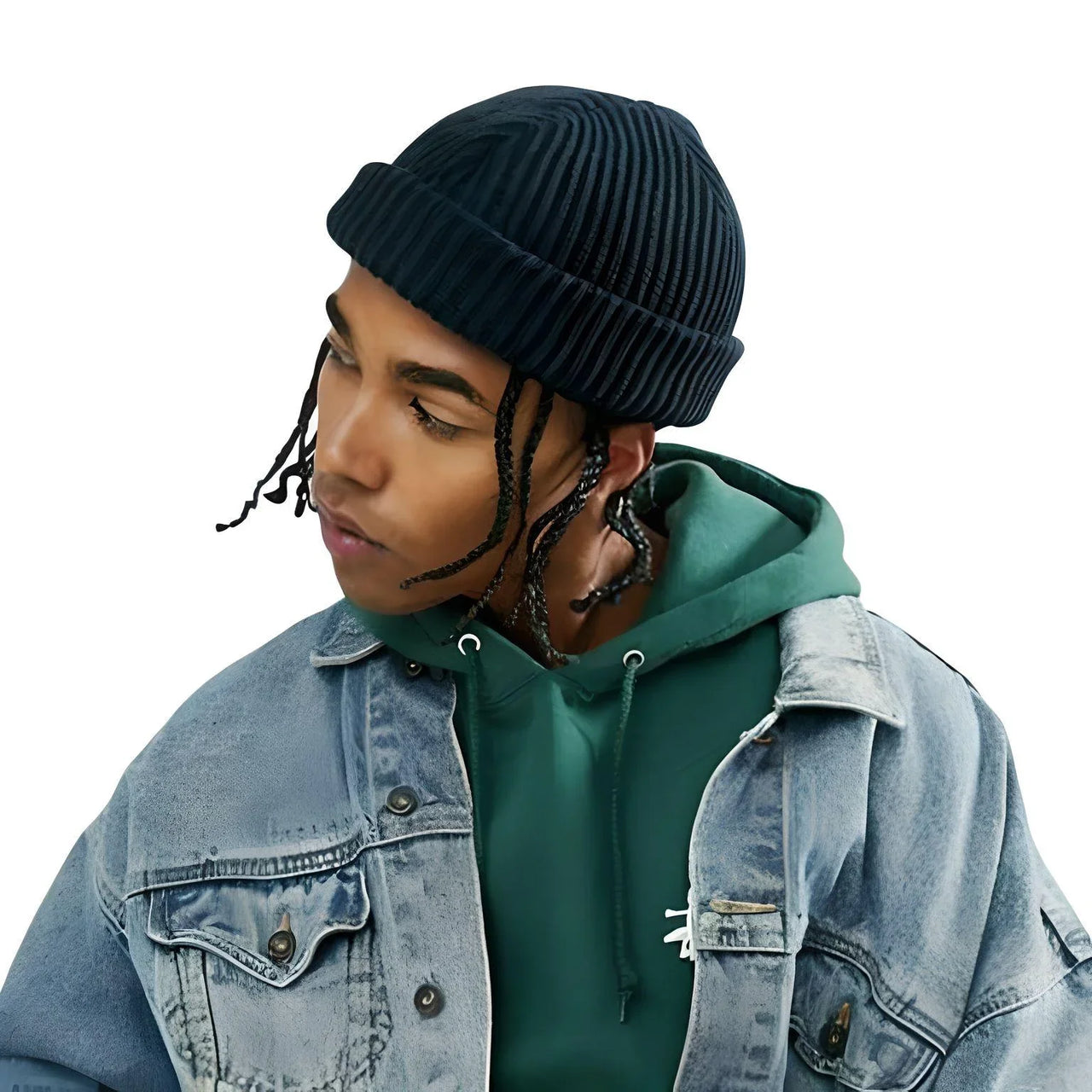 Person wearing a black beanie, green hoodie, and denim jacket on a white background
