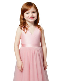 Thumbnail for Young girl wearing a pink dress on a white background