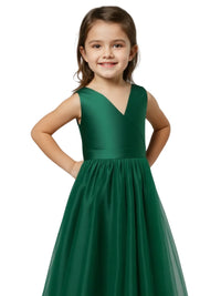 Thumbnail for Young girl wearing a green dress on a white background