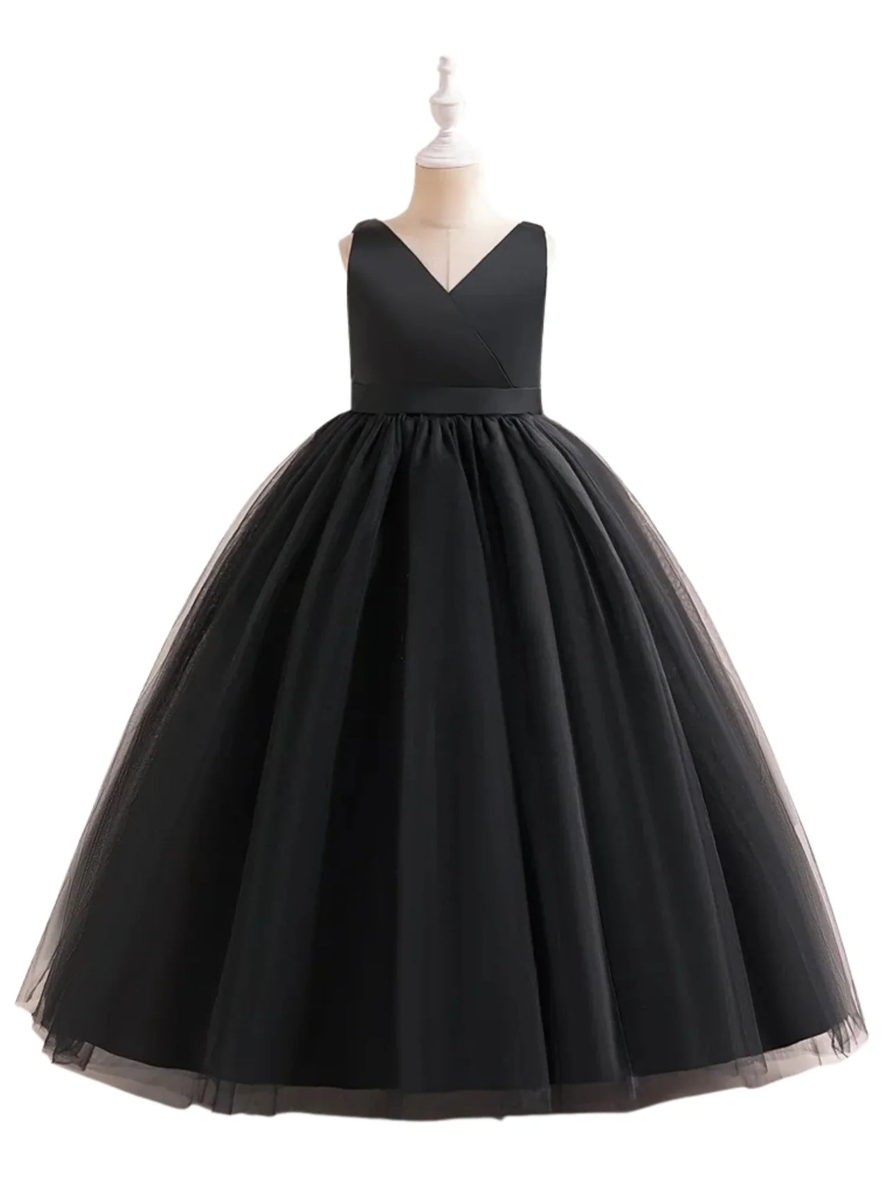 Black formal dress on a mannequin against a white background