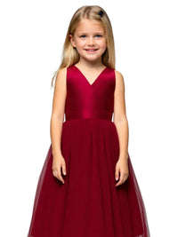 Thumbnail for Young girl wearing a red dress on a white background