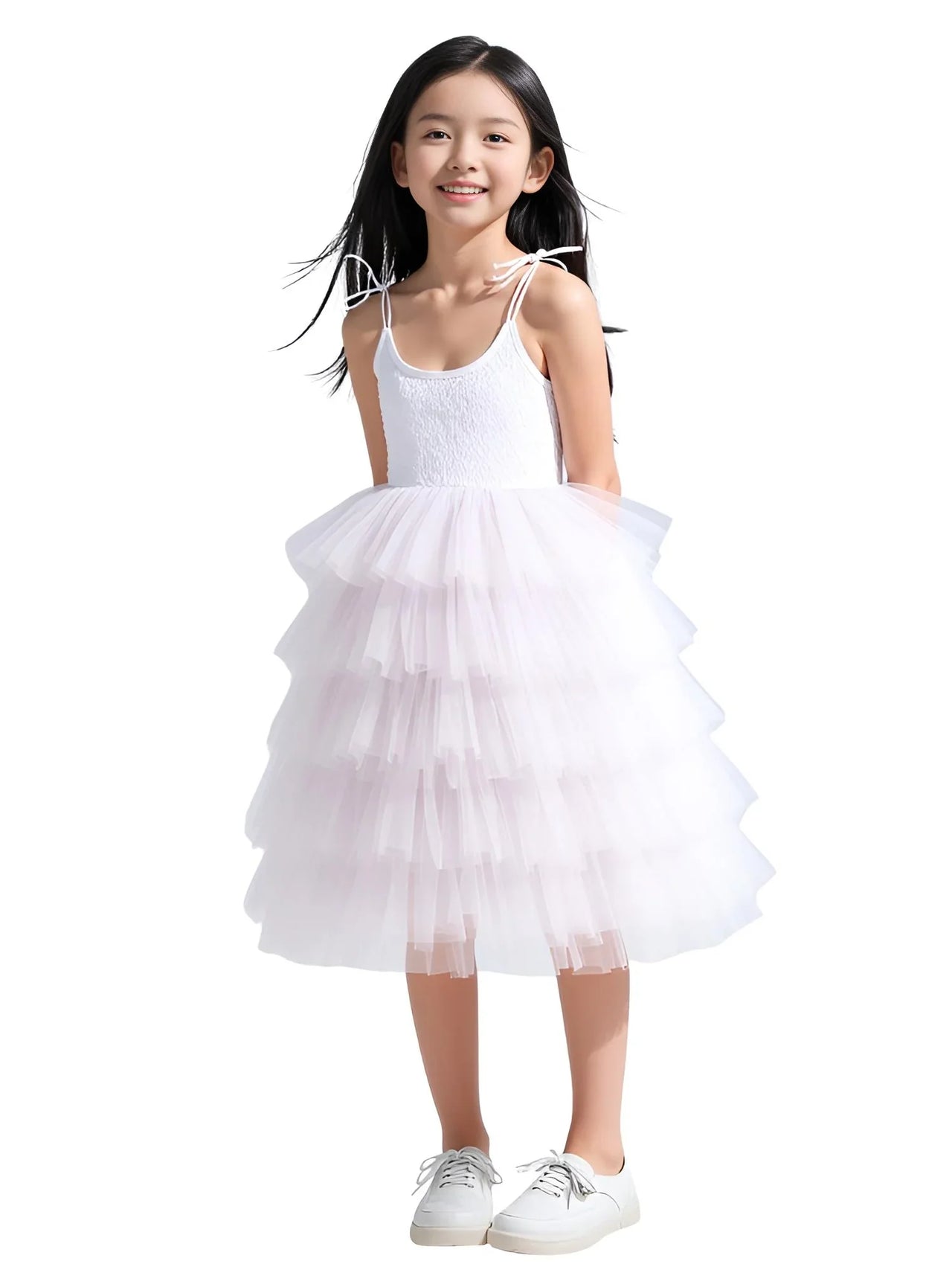 Young girl wearing a white dress with a white background
