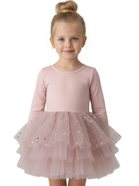 Thumbnail for Young girl wearing a pink long sleeved ballet tutu dress on a white background