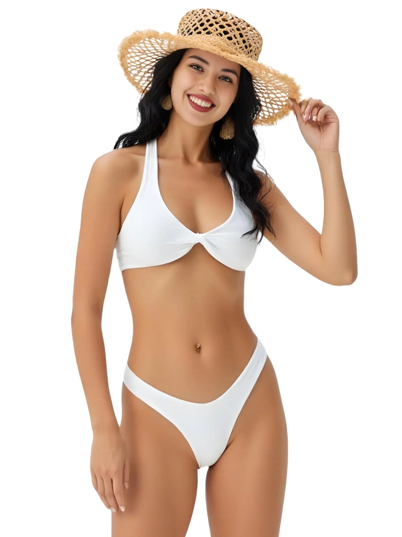 Woman wearing a white bikini and straw hat on a white background