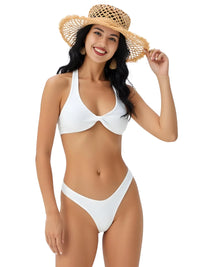Thumbnail for Woman wearing a white bikini and straw hat on a white background