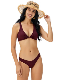 Thumbnail for Woman wearing a coffee bikini and straw hat on a white background