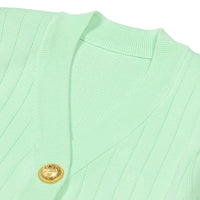 Thumbnail for Light green cardigan with a gold button on a white background