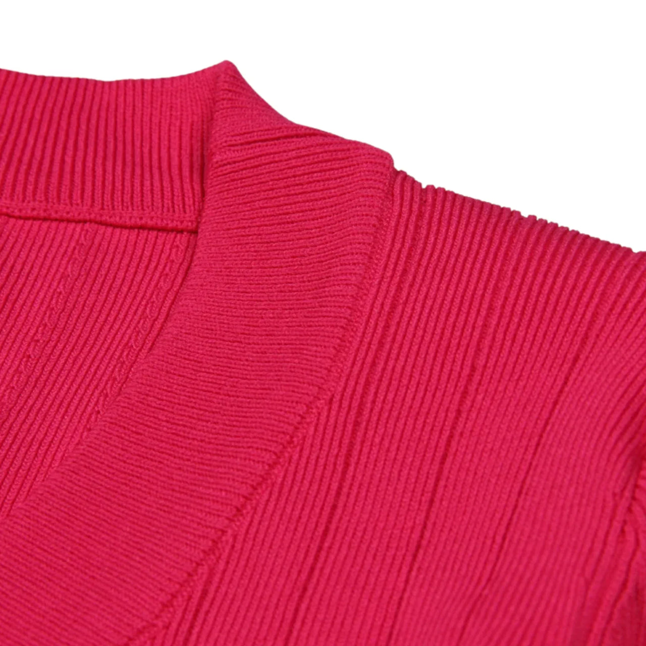 Close-up of a pink knitted garment on a white background