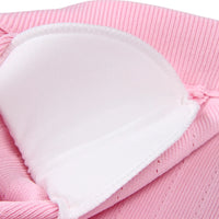 Thumbnail for Close-up of a pink cardigan with a shoulder pad on a white background