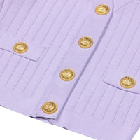 Thumbnail for Close-up of a light purple cardigan with a gold button on a white background