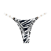 Thumbnail for Zebra print g-string panties with gold accents on a white background
