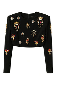 Thumbnail for Black long-sleeve top with colorful embellishments on a white background
