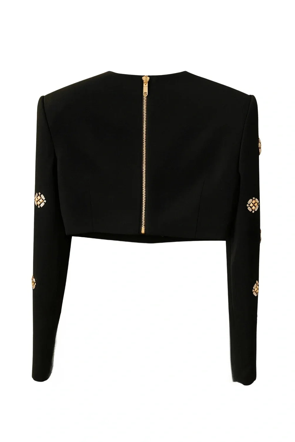 Black long-sleeve top with gold embellishments on a white background