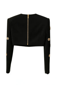 Thumbnail for Black long-sleeve top with gold embellishments on a white background
