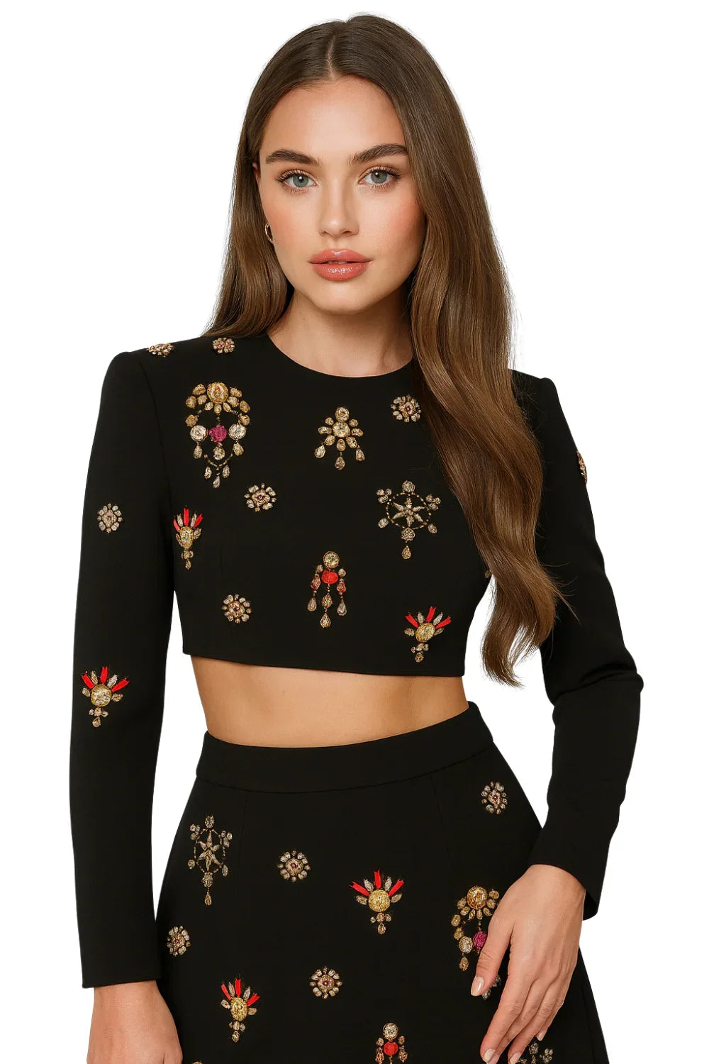 Woman wearing a black skirt set with rhinesones on a white background