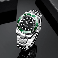 Thumbnail for Wristwatch with green bezel and black face on a reflective black surface