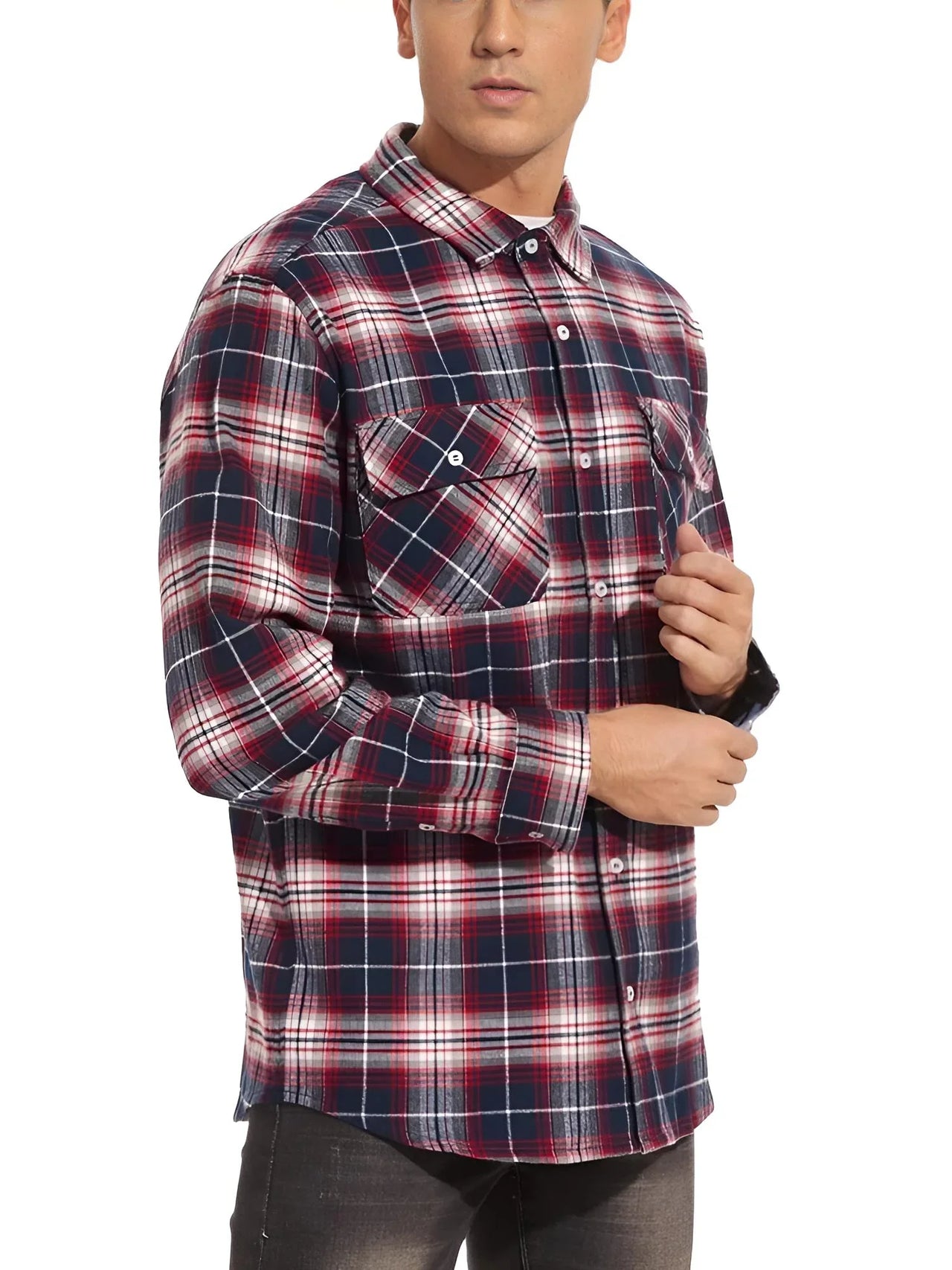 Man wearing a red and blue plaid shirt on a white background