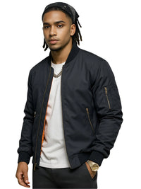 Thumbnail for Man wearing a dark gray bomber jacket over a white shirt on a white background