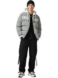 Thumbnail for Person wearing a gray puffer jacket with brand logos on a white background