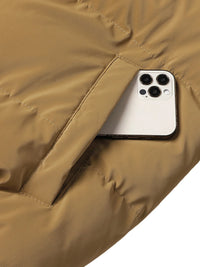 Thumbnail for Smartphone peeking out from a brown jacket pocket