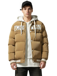Thumbnail for Man wearing a brown puffer jacket with visible branding on a white background