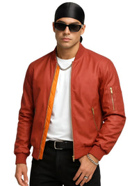 Thumbnail for Man wearing an orange bomber jacket with orange lining, black pants, and sunglasses on a white background