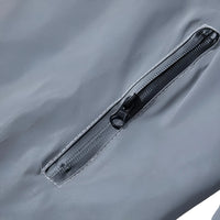 Thumbnail for Close-up of a black zipper on a gray reflective jacket