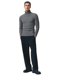 Thumbnail for Man wearing a dark gray turtleneck sweater on a white background